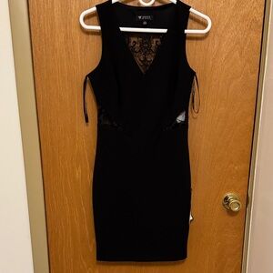 Sz2 GUESS black sheath body con lace/sequin cut outs. Above the knee LBD.